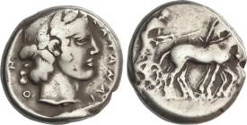 Tetradracma. 450-445 a.C. KATANE. SICILIA. Anv.: Auriga, sosteniendo kentron y riendas, conduciendo una cuadriga a derecha. Rev.: Cabeza laureada de A...
