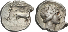 Tetradracma. 435-412 a.C. KATANE. SICILIA. Anv.: Auriga, sosteniendo kentron y riendas, conduciendo una cuadriga hacia la derecha; arriba, Nike voland...