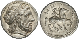 Tetradracma. 359-336 a.C. FILIPO II. AMPHIPOLIS. MACEDONIA. Anv.: Cabeza de Zeus laureado a derecha. Rev.: Jinete marchando a derecha, debajo delfín y...