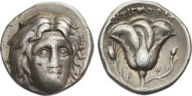 Didracma. 305-275 a.C. RODAS. ISLAS DE CARIA. Anv.: Cabeza de Helios de frente. Rev.: Rosa, a los lados P-O, arriba: ANTI¶AT¶O¶. 6,61 grs. AR. HGC 6-1...
