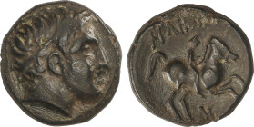 AE 15. 359-336 a.C. FILIPO II. MACEDONIA. Anv.: Cabeza de Apolo a derecha. Rev.: Jinete a derecha, encima leyenda. 5,55 grs. AE. (Reverso burilado). P...
