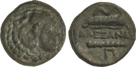 AE 16. 336-323 a.C. ALEJANDRO MAGNO. MACEDONIA. Anv.: Cabeza de Hércules con piel de león a derecha. Rev.: Arco y carcaj, leyenda, clava debajo simbol...