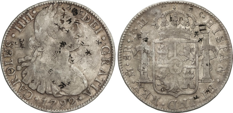 8 Reales. 1792. MÉXICO. F.M. 26,56 grs. Resellos chinos. (Golpecitos). AC-954. M...