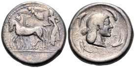 SICILY. Syracuse. Deinomenid Tyranny, 485-466 BC. Tetradrachm (Silver, 25 mm, 16.65 g, 5 h). Charioteer driving slow quadriga walking to left, holding...