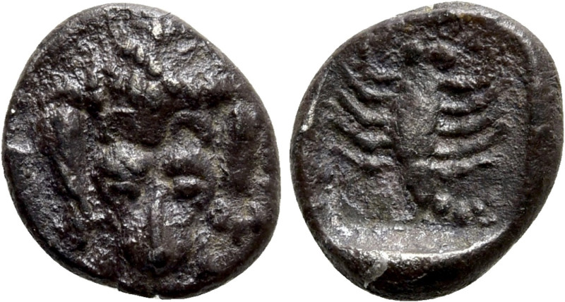 CARIA. Mylasa. Obol (Circa 450-400 BC). 

Obv: Facing forepart of lion.
Rev: ...