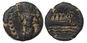 PHOENICIA. Sidon (?). Ae (bronze, 1.28 g, 11 mm). Phoenician galley right, waves below. Rev. Uncertain figure (Tyche or Astarte?) standing, holding wr...
