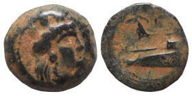 PHOENICIA. Arados, circa 242-166 BC. Ae (bronze, 3.68 g, 17 mm). Turreted head of Tyche right. Rev. Athena standing left on prow of galley left; monog...
