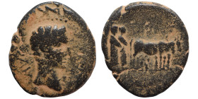 MACEDONIA. Philippi. Tiberius, 14-37 AD. Ae (bronze, 3.34 g, 19 mm). Bare head of Tiberius. Rev. Two priests ploughing with two oxen. RPC 1657. Nearly...
