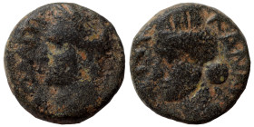 SYRIA, Decapolis. Canata. Domitian, 81-96. (bronze, 1.97 g, 12 mm). ΔOMITI KAICAP Laureate head of Domitian to left. Rev. KANATA / ZNP Turreted and dr...