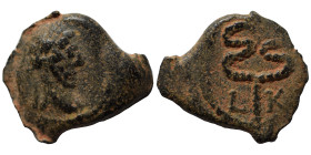 EGYPT. Alexandria. Hadrian, 117-138. Chalkous (bronze, 1.29 g, 14 mm), Laureate head right. Rev. Caduceus; L - K (date) across field. RPC III 6128. Ve...