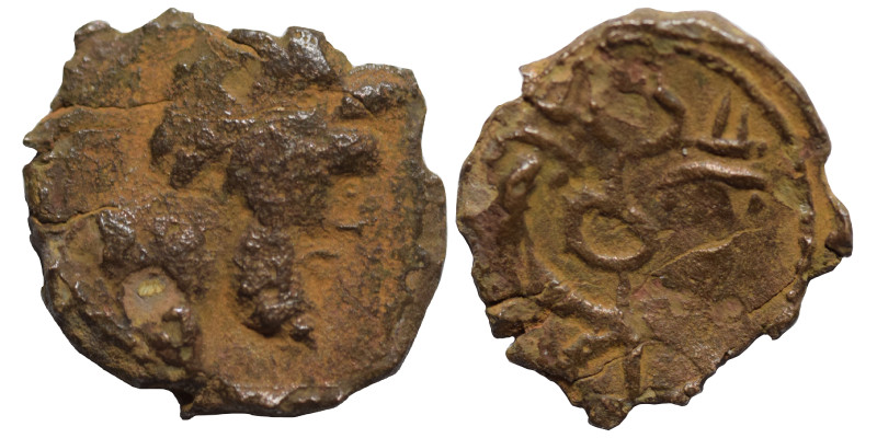 Uncertain. Ae (bronze, 0.40 g, 10 mm). Male head right. Rev. Winged caduceus bet...