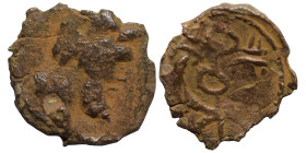 Uncertain. Ae (bronze, 0.40 g, 10 mm). Male head right. Rev. Winged caduceus between two crossed cornucopiae. Fine.