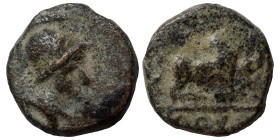 Uncertain. Ae (bronze, 0.71 g, 9 mm). Helmeted Athena right. Rev. Bull, traces of legend. Good fine.