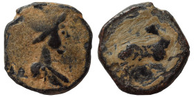 Uncertain. Ae (bronze, 0.91 g, 12 mm). Helmeted Athena right. Rev. Ram leaping right, head to left. Good fine.