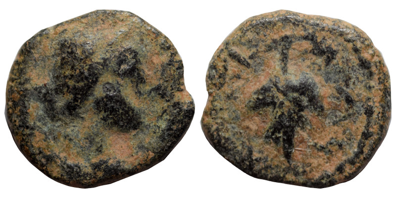 Uncertain. Ae (bronze, 1.04 g, 12 mm). Artemis (?) right. Rev. Leaf (?); crescen...