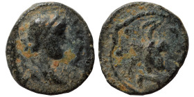Uncertain. Ae (bronze, 1.27 g, 13 mm). Artemis (?) right. Rev. Leaf (?); crescent. Fine.
