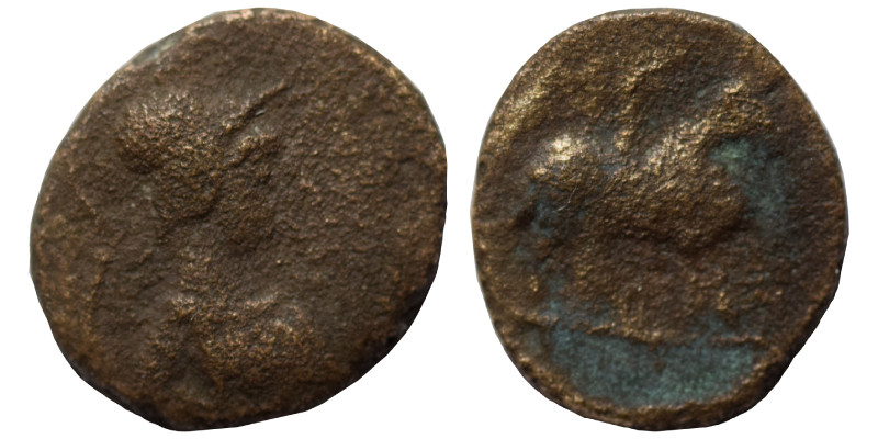 Uncertain. Ae (bronze, 0.85 g, 11 mm). Helmeted bust right. Rev. Horseman riding...