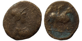 Uncertain. Ae (bronze, 0.85 g, 11 mm). Helmeted bust right. Rev. Horseman riding to right. Fine.