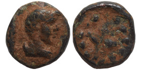 Uncertain. Ae (bronze, 0.84 g, 10 mm). Male head right. Rev. Branch(?) within pelleted border. Good fine.
