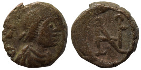 Zeno, 476-491. Nummus (bronze, 1.14 g, 10 mm), Antioch. Pearl-diademed, draped, and cuirassed bust right. Rev. Zeno monogram 4a within wreath. RIC X 9...