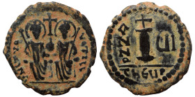 Justin II, with Sophia. 565-578. Decanummium (bronze, 3.12 g, 20 mm), Theoupolis (Antioch), RY 6 = 570/1. Justin II, holding scepter in his right hand...