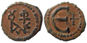 Justin II, 565-578. Pentanummium (bronze, 1.42 g, 15 mm), Theoupolis (Antioch). Monogram of Justin II. Rev. Large Є, cross to right. SB 386. Very fine...