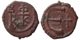 Justin II, 565-578. Pentanummium (bronze, 1.36 g, 14 mm), Theoupolis (Antioch). Monogram of Justin II. Rev. Large Є, cross to right. SB 386. Very fine...