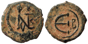 Justin II, 565-578. Pentanummium (bronze, 1.87 g, 17 mm), Theoupolis (Antioch). Monogram of Justin II. Rev. Large Є, cross to right. SB 363. Nearly ve...