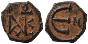 Justin II, 565-578. Pentanummium (bronze, 2.82 g, 14 mm), Nicomedia. Monogram of Justin II. Rev. Large Є; in field to right, N. DOC 116. MIB 49. SB 37...