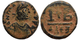 Maurice Tiberius, 582-602. 12 Nummi (bronze, 4.01 g, 16 mm), Alexandria. Laureate, draped, and cuirassed bust right. Rev. Cross between I-B; AΛEΞ. DOC...