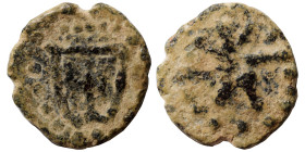 Uncertain. Ae (bronze, 1.04 g, 13 mm). Uncertain pattern within pelleted border. Rev. Star within pelleted border. Nearly very fine.