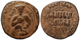 Ayyubids. Al-Ashraf Musa, Muzaffar al-Din, AH 607-617 / AD 1210-1220. Ae Dirham (bronze, 10.20 g, 29 mm), Mayyafariqin mint. Turbaned prince seated fa...