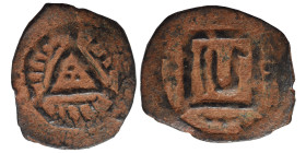 Uncertain. Ae (bronze, 1.13 g, 18 mm). Triangular pattern with three central pellets; legend around. Rev. Tamgha (?). Nearly very fine.