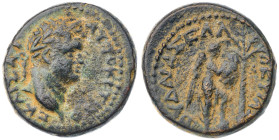 Judaea. Caesarea Maritima. Titus, as Caesar. Æ 22, AD 79-81. Laureate head right / Victory standing right, foot on helmet, inscribing shield set on pa...
