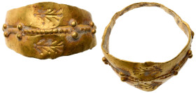 Greek Ring. Gold AV (weight), 4th Century BC. A thin, narrow, and wavy ring with two fig (?) designs.

Very Fine.