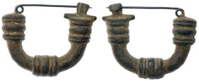Greek Fibula. Bronze Æ (61.3 gr.), 5th-1st Century BC. A fibula with three bulbs to the bow and ribbed catch, sprung pin.

Very Fine.