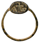 Byzantine Ring. Bronze Æ (1 gr.), 9th Century AD. A bronze finger ring comprising a slender hoop and conical bezel with an incised cross potent; A W b...