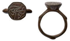 Islamic Ring. Bronze Æ (5.2 gr.), 16th-19th century AD. Face engraved in Arabic.

Intact, with a brown patina. Very Fine.