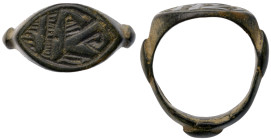 Islamic Ring. Bronze Æ (3.6 gr.), 16th-19th century AD. Face with incised design.

Intact, with a brown patina. Very Fine.
