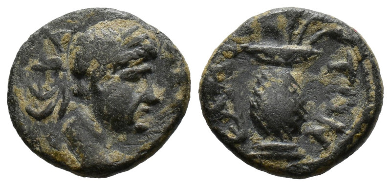AEOLIS. Elaia. Domitian (81-96). AE. 
 Laureate head right. 
Rev. Basket contain...