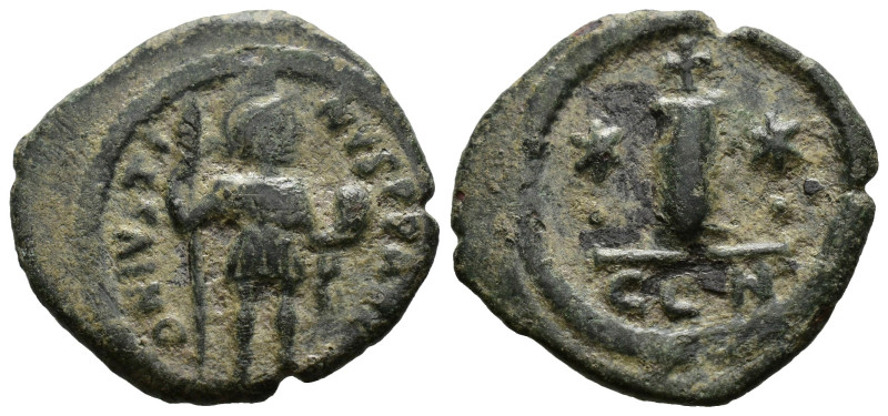 Justin II (565-578). AE 10 Nummi. Constantinople. 
Justin standing l., holding s...