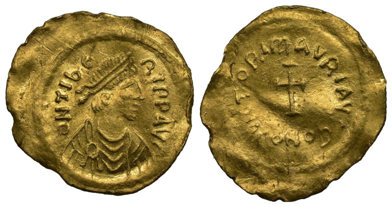 Tiberius II Constantine (AD 578-582). AV tremissis Constantinople.
 Diademed, dr...