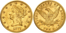 USA
10 Dollars 1877 CC, Carson City. Tête de la Liberté à gauche, entourée de 13 étoiles. Date en dessous / Ecusson sur une aigle aux ailes éployées....