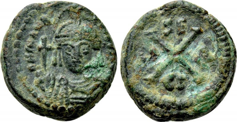 MAURICE TIBERIUS (582-602). Decanummium. Syracuse. 

Obv: Helmeted, draped and...