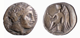 BRUTTIUM - TERINA (circa 300 a.C.) DRACMA gr.1,5 -D/Testa di ninfa a d. R/Nike seduta a s. su di un cippo - Ar - HN Italy 2641 BB