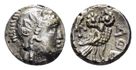 PALESTINE.Gaza.(Mid 4th century-333 BC).Obol.

Obv : Helmeted head of Athena right, with profile eye.

Rev : AΘE.
Owl standing right, head facing; to ...