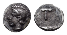 ARKADIA. Tegea.(Circa 423-400 BC).Tetartemorion.

Obv : Helmeted head of Athena Alea left.

Rev : T within shallow incuse square.
BCD Peloponnesos 172...
