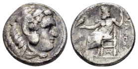KINGS OF MACEDON. Philip III Arrhidaios (323-317 BC).Kolophon.Drachm. 

Obv : Head of Herakles right, wearing lion skin.

Rev : ΦΙΛΙΠΠΟΥ.
Zeus seated ...