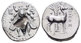 IONIA. Ephesos.(Circa 202-150 BC).Drachm. 

Obv : Ε - Φ.
Bee.

Rev : ΣΙNOΣ.
Stag standing right; palm tree behind.

Condition : Very fine.

Weight : 3...