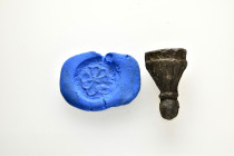 ANCIENT ROMAN BRONZE STAMP SEAL.(1st-2nd century).Ae.

Weight : 13.2 gr
Diameter : 24 mm